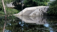 A&uacute;n siguen inundados varios parques de M&eacute;rida