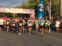 Rub&eacute;n L&oacute;pez y Meraly Tun ganan Carrera con Causa Amanc