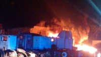 Arde depósito de vehículos