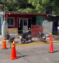 Investigan da&ntilde;os a predio por detonaciones de arma de fuego